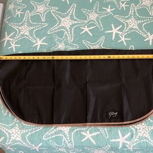 The Gussy-NWOT Rain Cover for purses or totes. 36”W x  16.5”L lying flat.